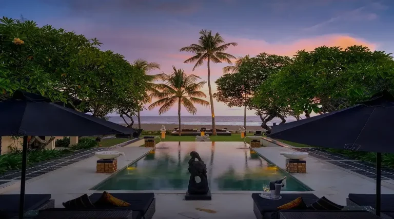 Luxury Bali resort with pool and palm trees