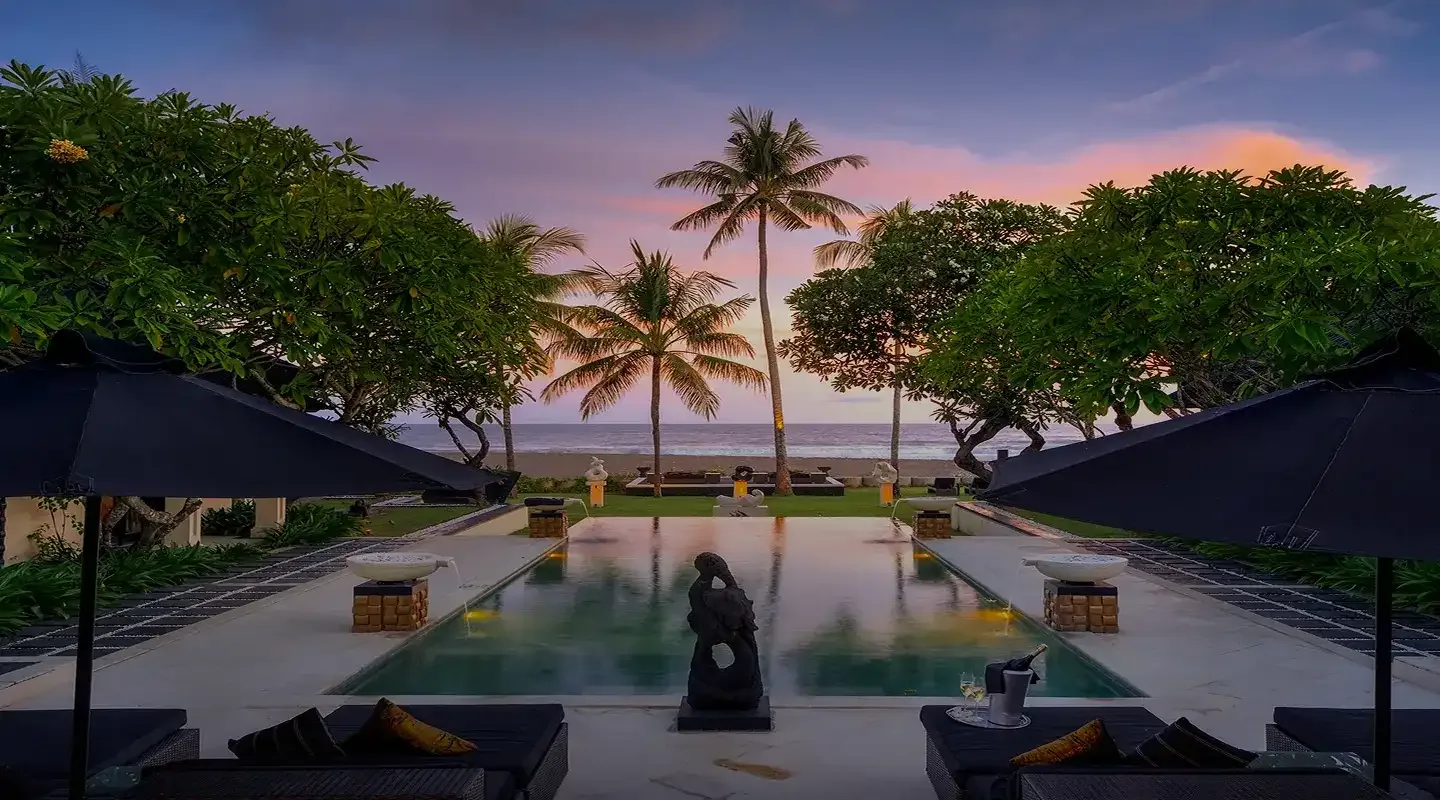 Luxury Bali resort with pool and palm trees